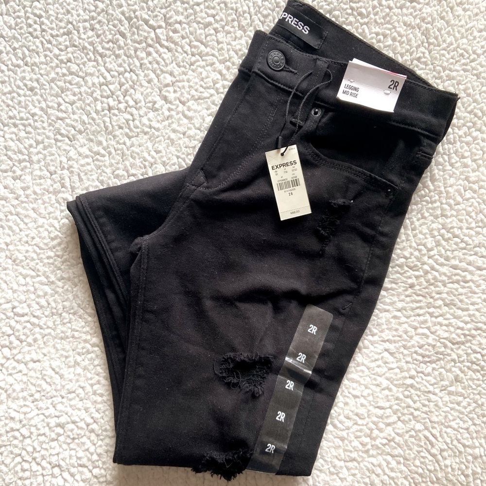 Distressed Black Mid Rise Jean
